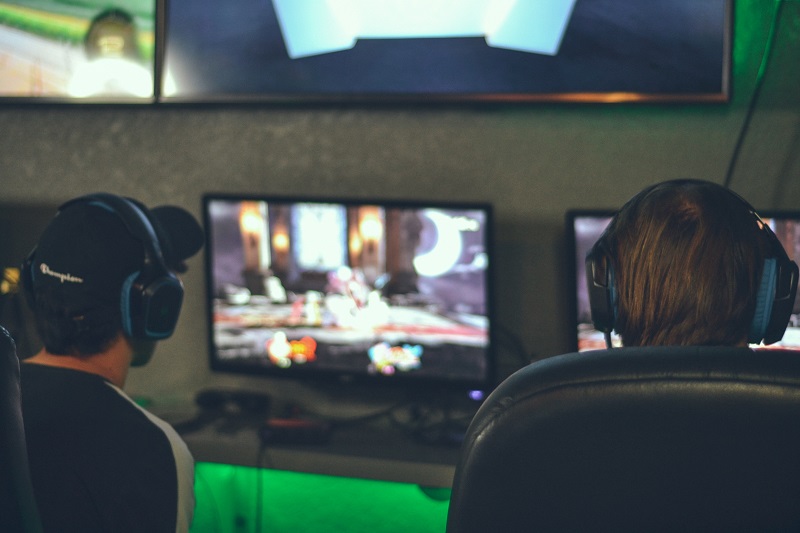 teens playing a multiplayer online video game