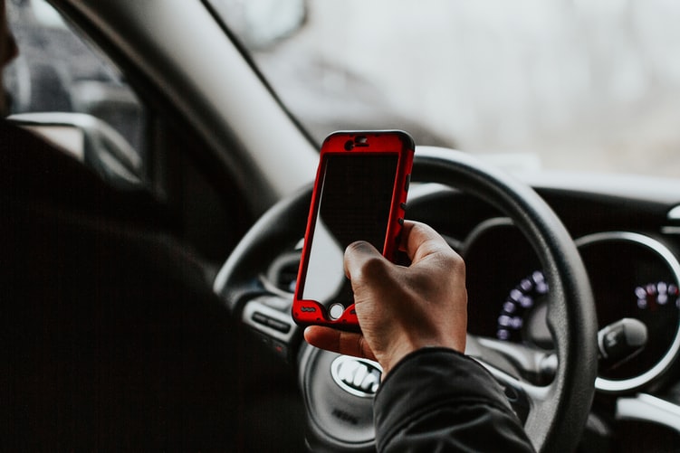 Texting with Black Phone In a Car